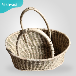Hand made oval shaped fruit basket of sabai grass and date palm leaf thread